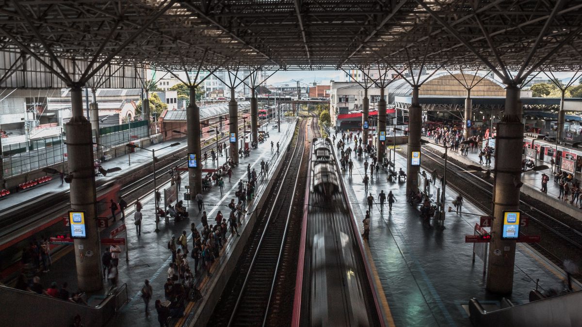 Commuters moving through a São Paulo railway station